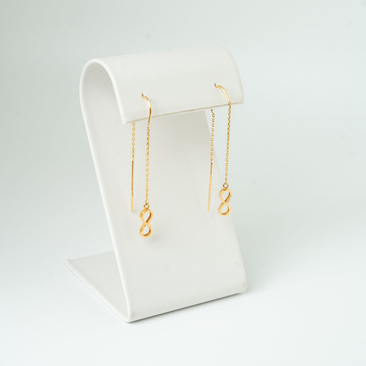 Pendientes de hilo infinito de oro de 18 quilates