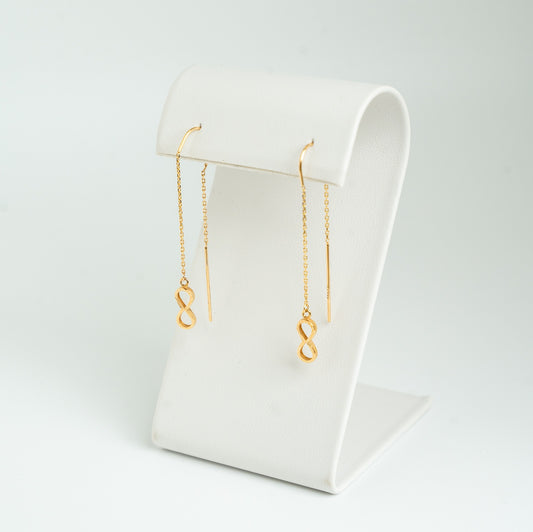 Pendientes de hilo infinito de oro de 18 quilates